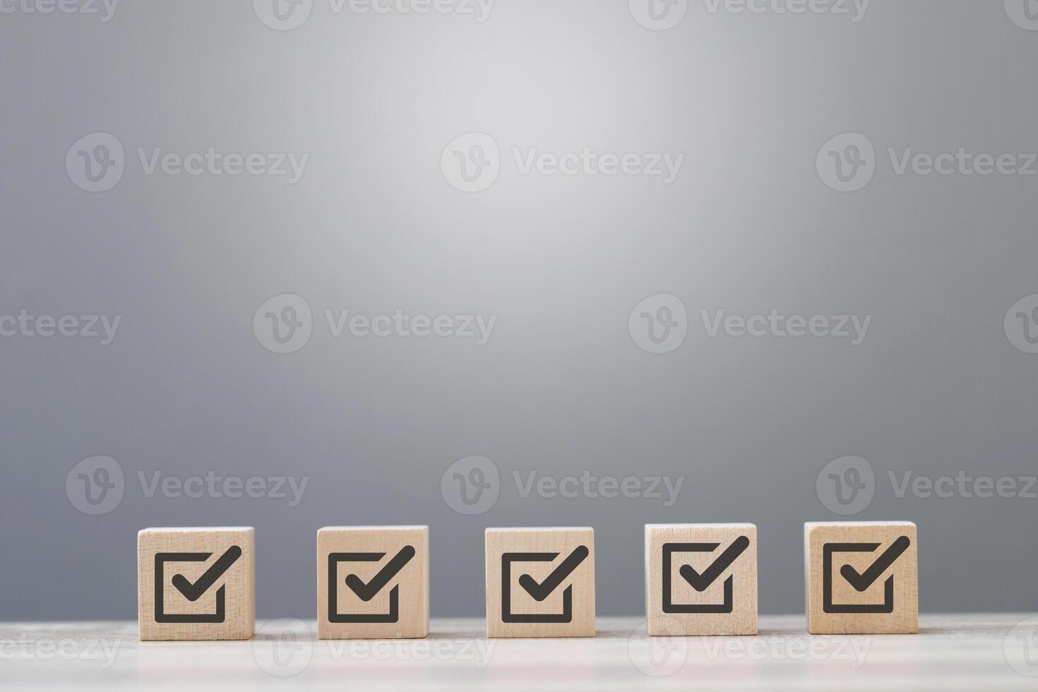 wood cube block with customer satisfaction rating to measure product evaluation photo