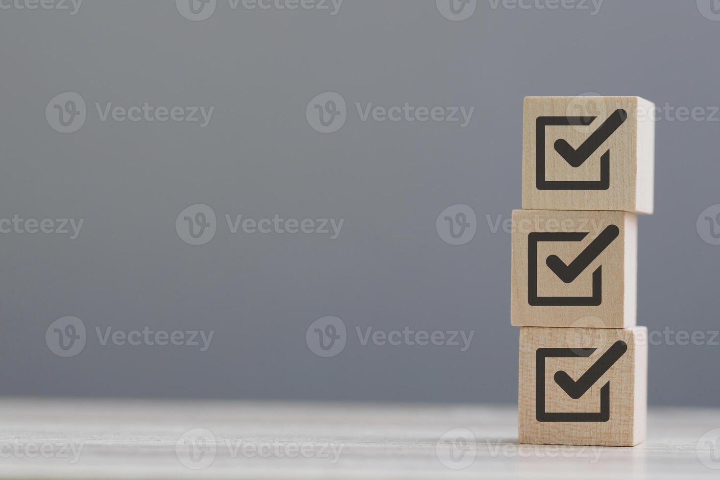 wood cube block with customer satisfaction rating to measure product evaluation photo