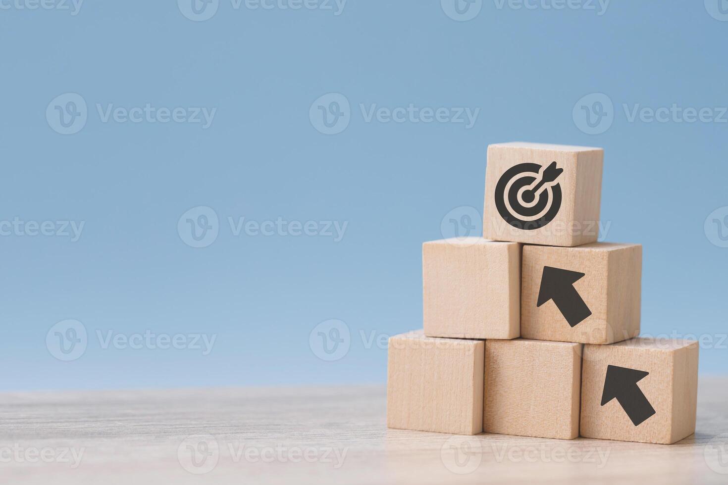 wood cube block with growth according to business goals photo