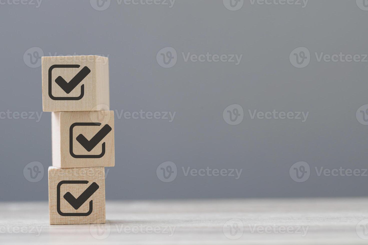 wood cube block with customer satisfaction rating to measure product evaluation photo