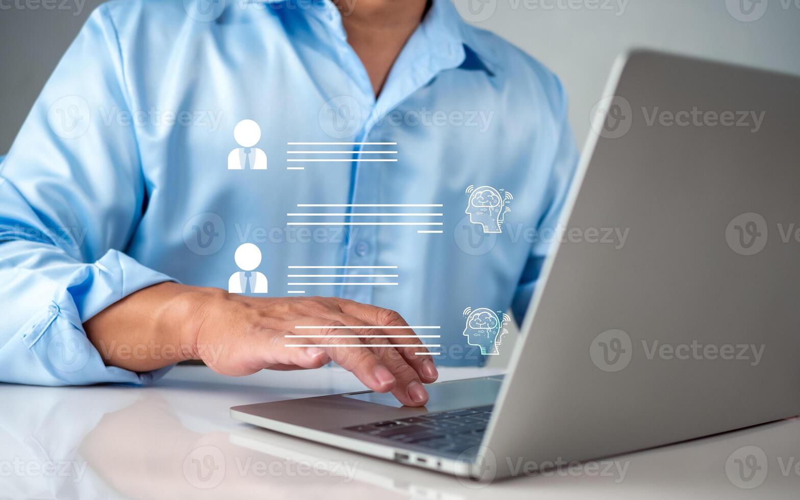 Businessman use computer technology to type live chat with intelligent computer to find information, ask, answer with an artificial intelligence system, chatbot, Ai assistant. photo