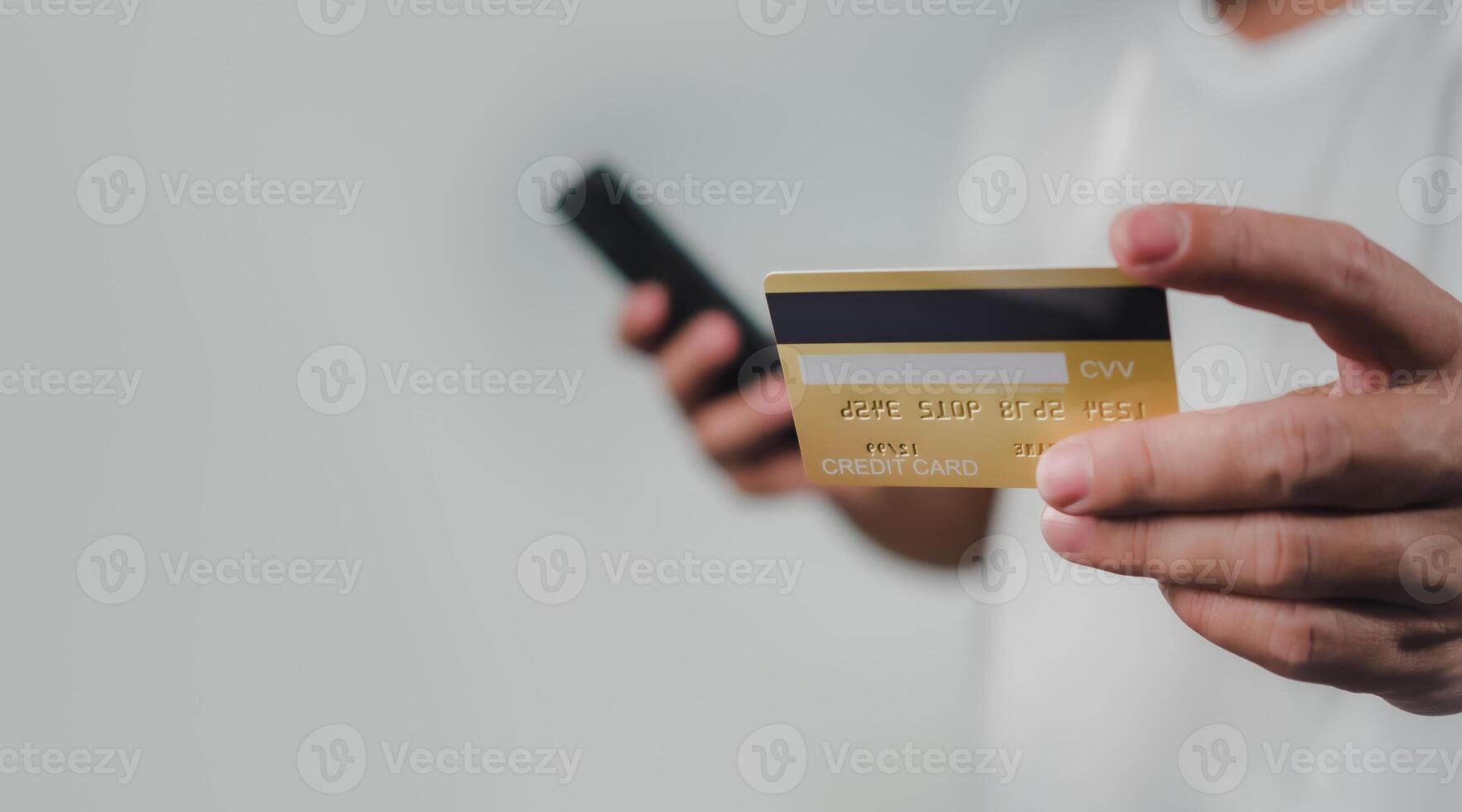 Online payment, Man using mobile smartphone and credit card for online shopping, Digital online payment concept, Technology online banking applications via internet network, financial transaction. photo