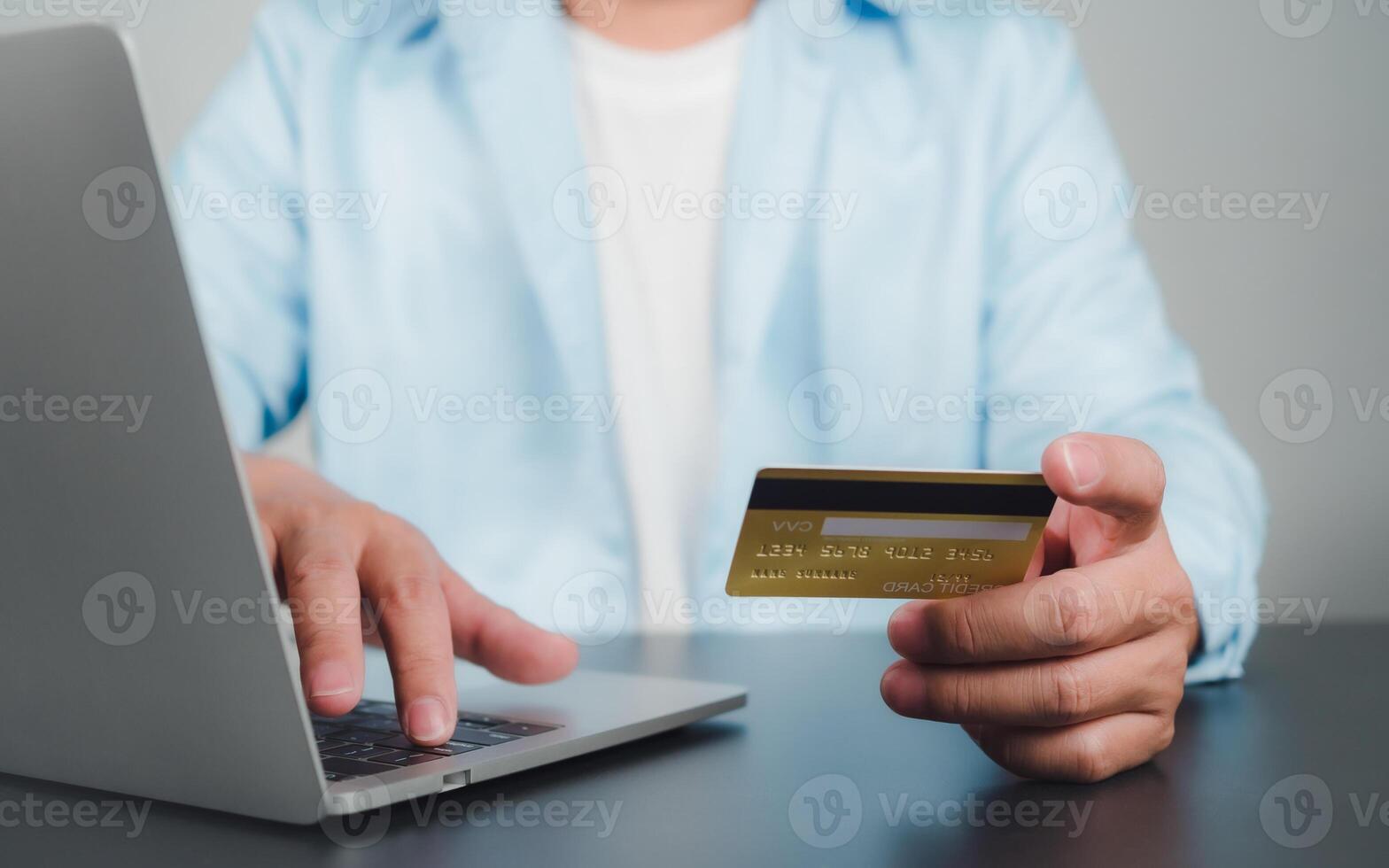 Online payment, Man using computer and credit card for online shopping, Digital online payment concept, Technology online banking applications via internet network, financial transaction. photo