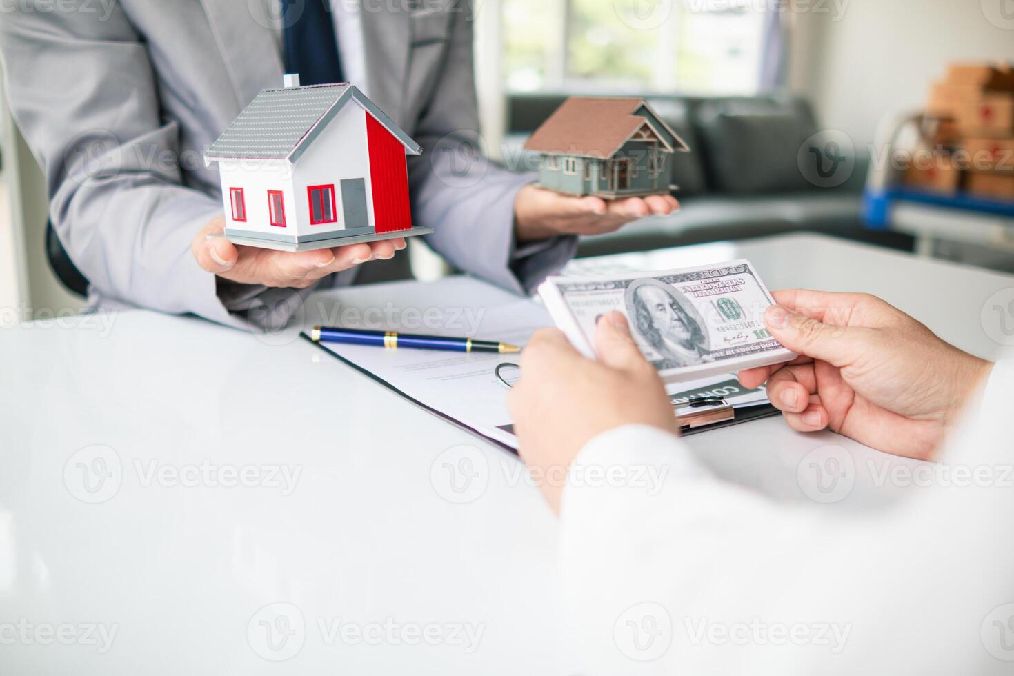 Real estate brokers are offering sample homes for customers choose from and recommending estate insurance promotions help protect their properties. Concept of offering real estate and home insurance photo