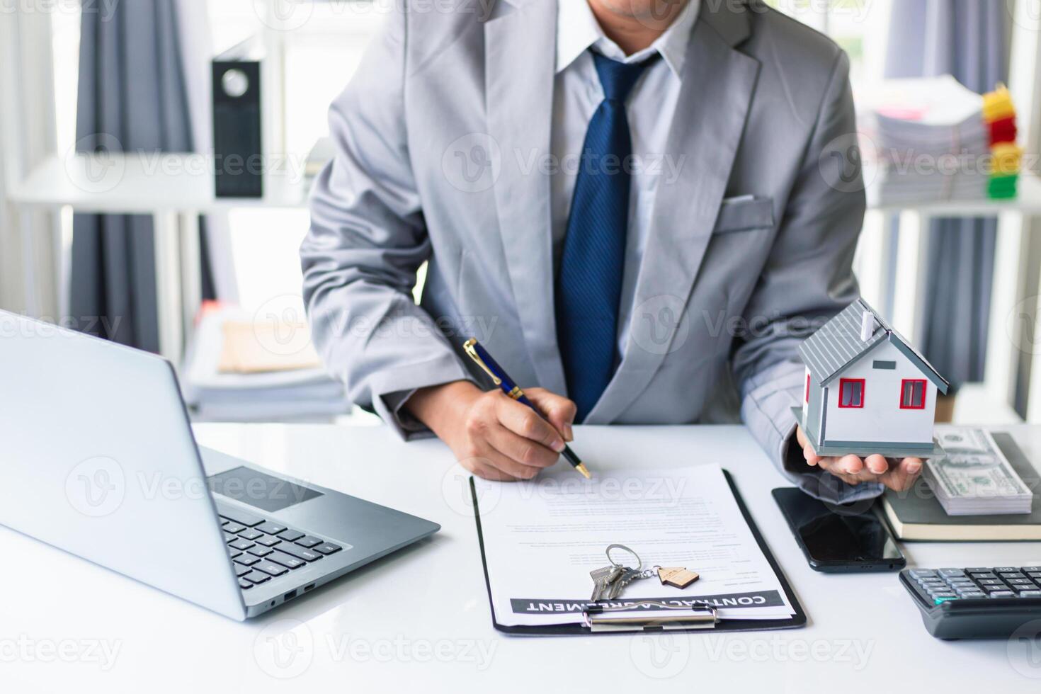 Real estate brokers are offering sample homes for customers choose from and recommending estate insurance promotions help protect their properties. Concept of offering real estate and home insurance photo