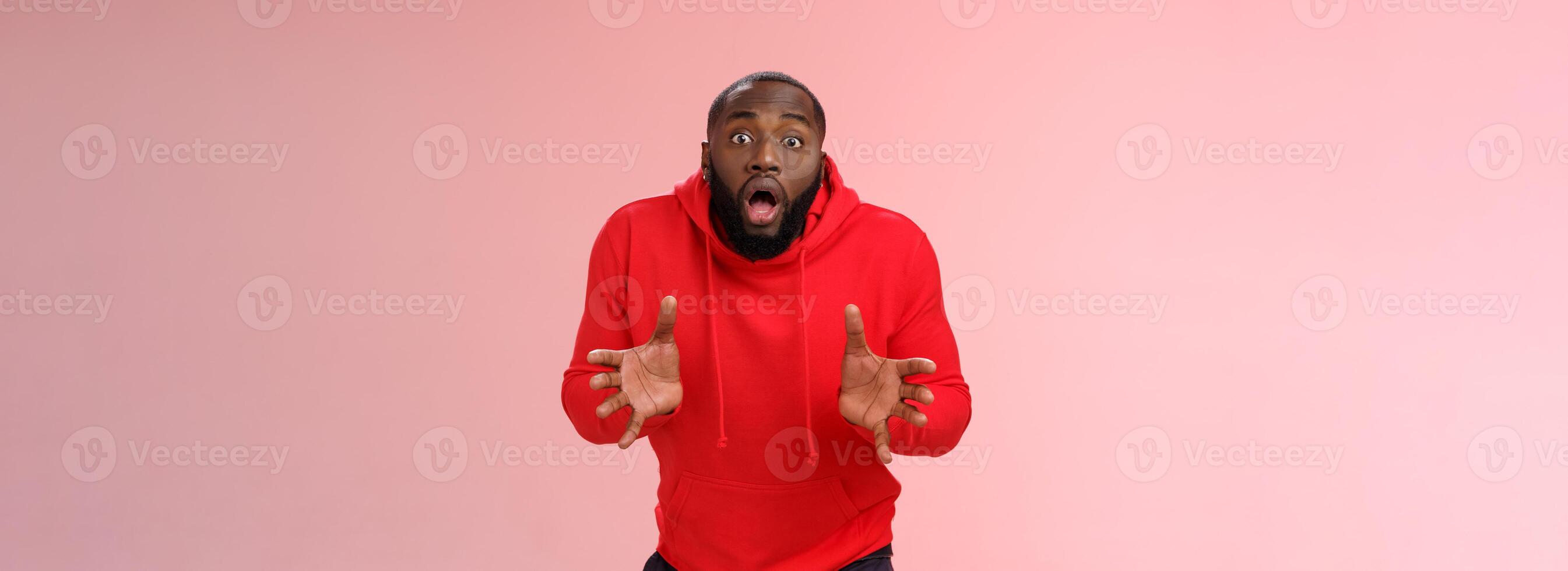 Shocked concerned young man worried employee drop fragule thing standing stupor intense stooping bending widen eyes troubled gesturing asking be careful, nervous pink background photo