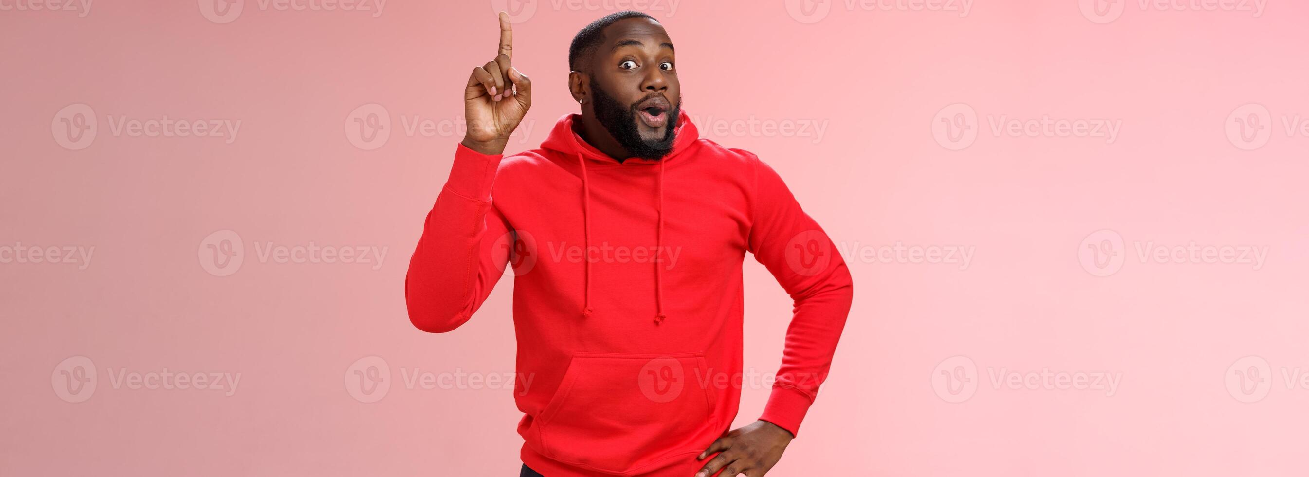 Man got excellent idea standing excited widen eyes inhale air perform speech raising proudly index finger eureka gesture have solution great plan standing pink background express thought photo