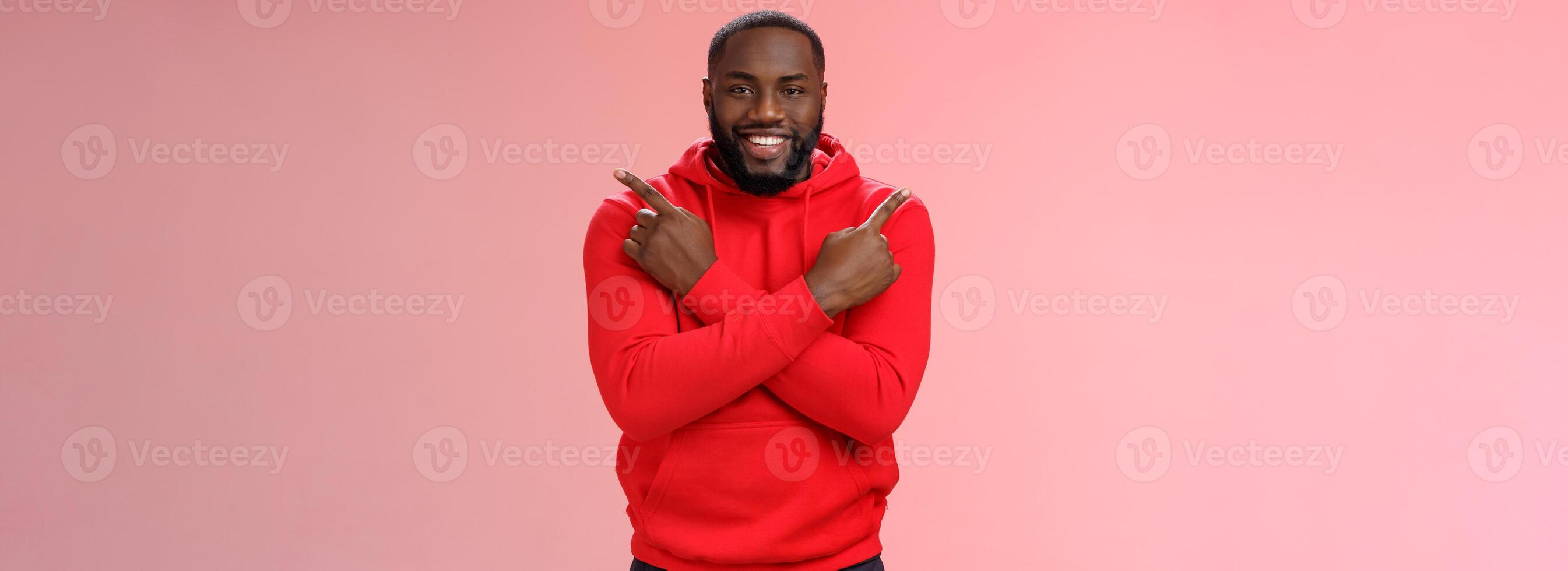 Happy handsome bearded boyfriend pointing different sides cross fingers left right smiling happily asking girlfriend opinion advice what choice make, proposing opportunities variety products photo