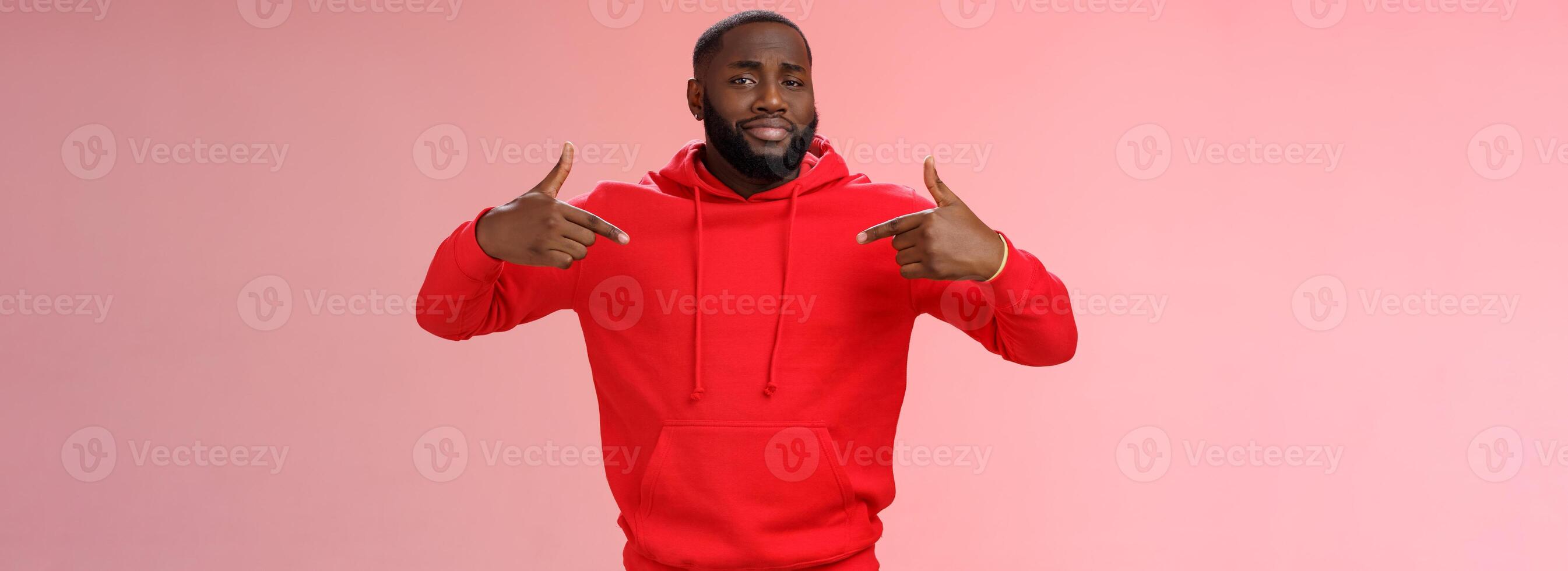 Proud cheeky confident young bearded african american man pointing himself bragging charish praise himself standing spotlight liking be center attention, smirking gladly, pink background photo