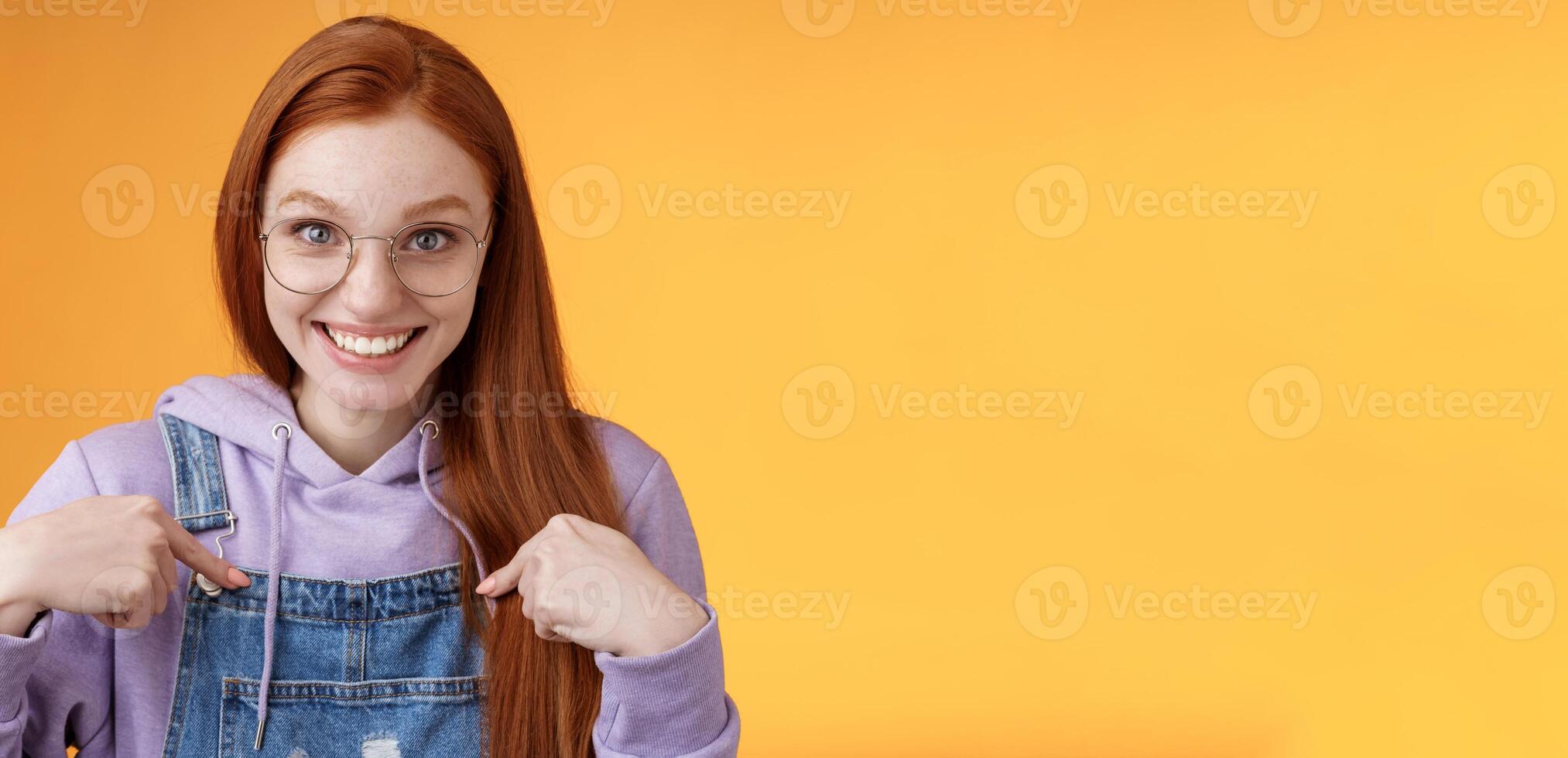 Surprised happy pleased happy smiling young redhead girl getting awesome proposal grinning questioned pointing herself laughing full disbelief receive promotion unbelievable chance photo