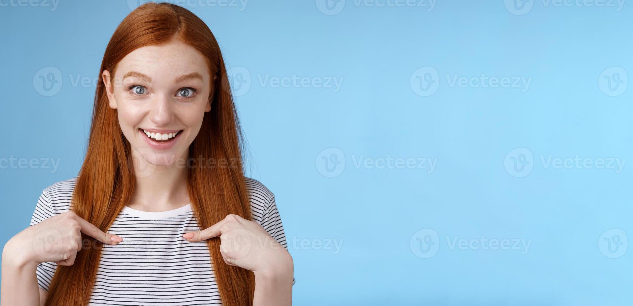 Surprised glad impressed excited redhead girl blue eyes stare camera fascinated cannot believe win pointing herself questioned amused getting nominated first place, picked receive scholarship photo