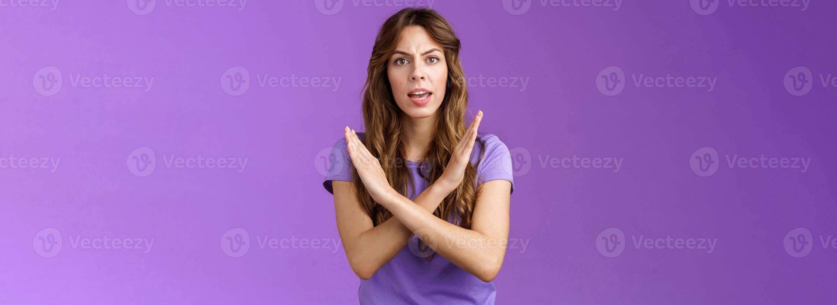 Quit fooling around. Serious-looking woman bad mood bossy angry make cross fighting lgbtq rights demand stop discrimination forbidding cruel behaviour say no purple background photo