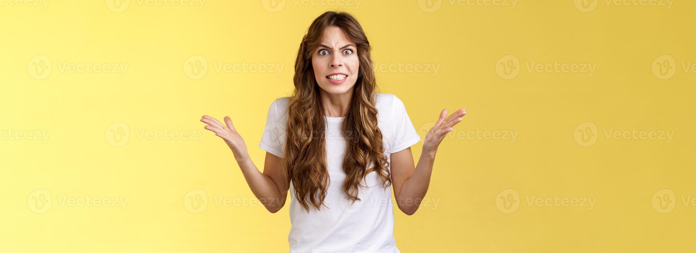 Intense pressured scary woman arguing pissed shaking hands dismay outraged frowning grimacing stare camera furious release anger complaining having fight fed up stupid boyfriend actions photo