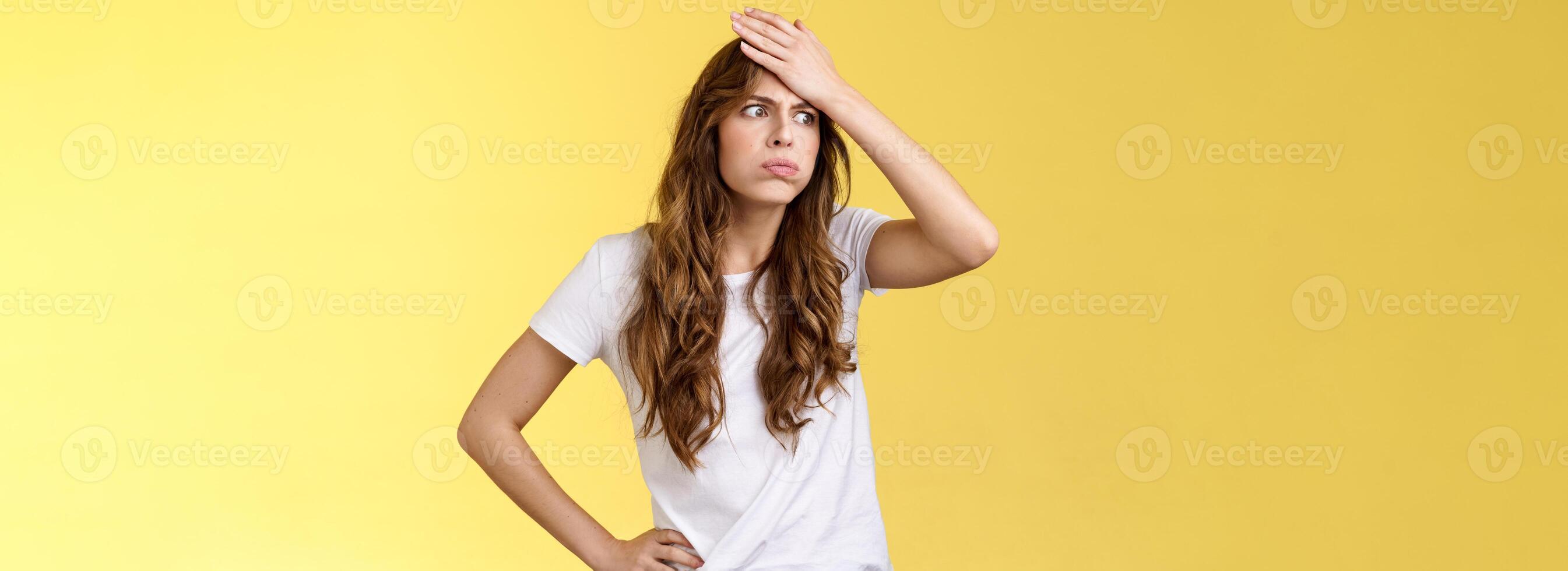 Perplexed tired troubled girl have lots work feel pressured distressed breath out sighing difficult task piles documents hardoworking, punch forehead look away intense exhausted photo