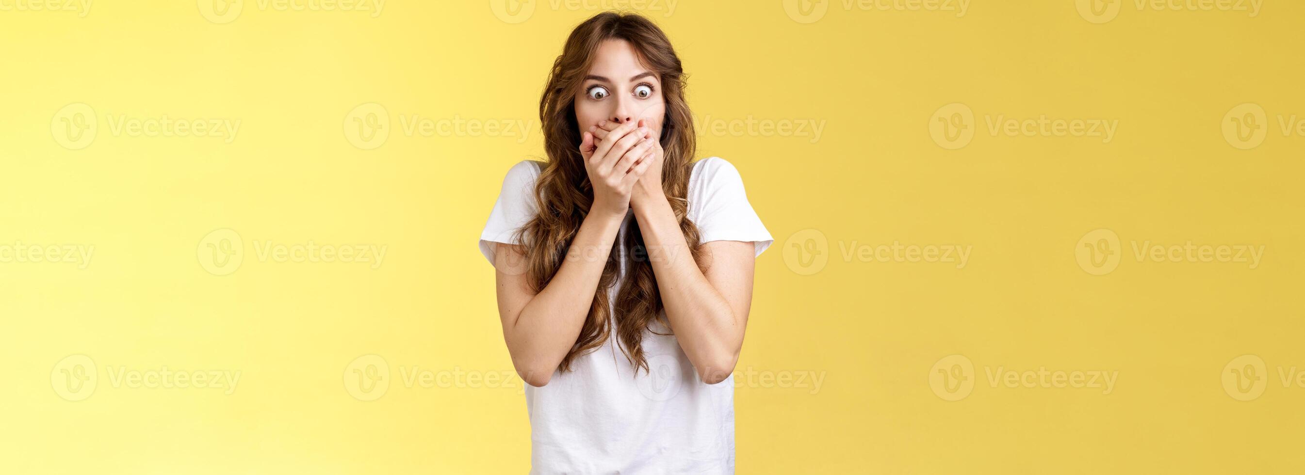 Shocked speechless amazed stupefied cute girl learn terrible impressive huge rumor stare popping eyes surprised amazed shut mouth gasping hold hands lips realise astonishing gossip true photo