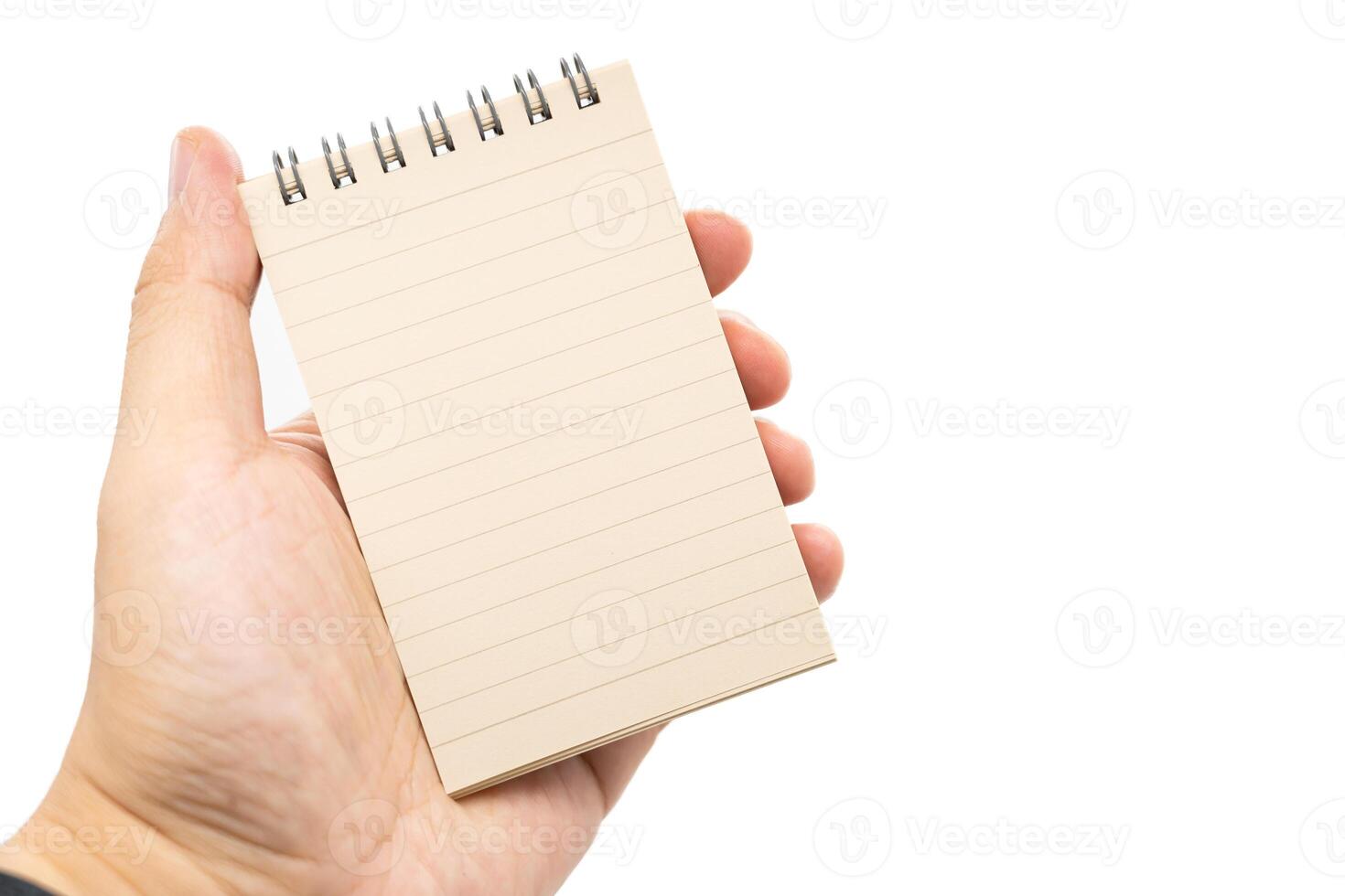 Spiral notepad isolated on white background. Blank one face brown paper note. empty sheet of brown lined papers. photo