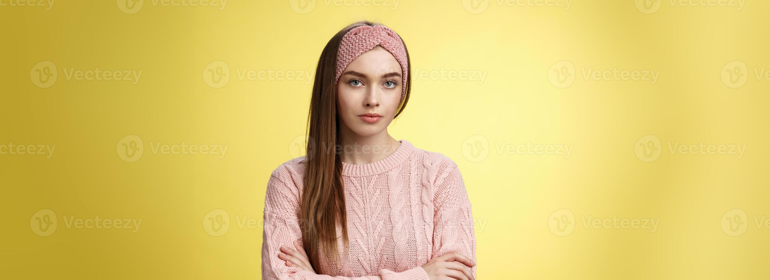 Serious-looking bossy focused intense young female office worker cross arms over chest in defensive confident pose, being displeased, dissatisfied and pissed with inappropriate employee behaviour photo