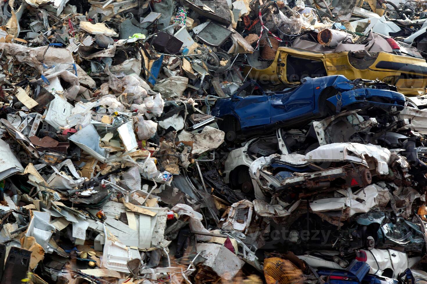 Pile of scrap metal in recycling center photo