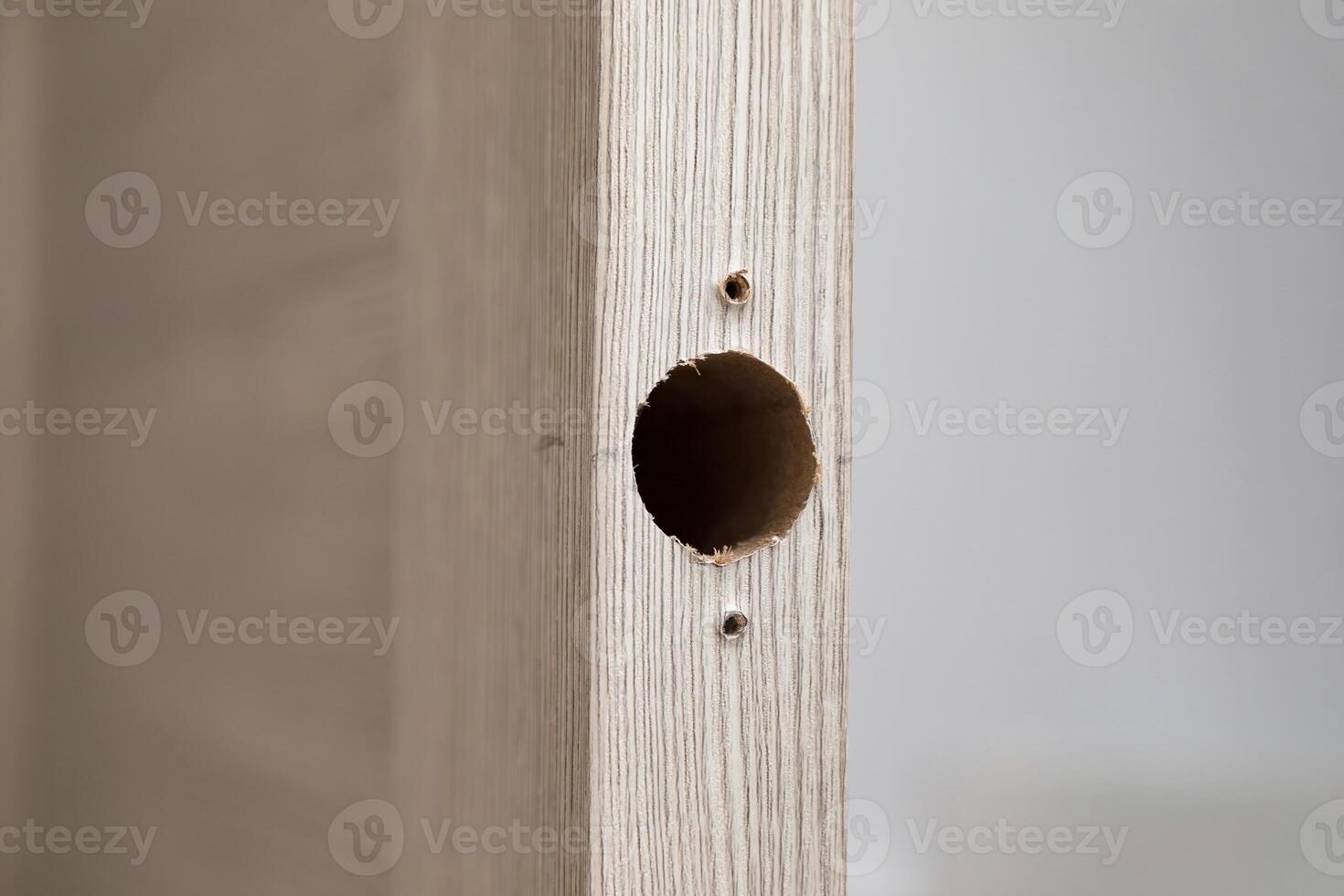 Installing a new door handle, closeup shot photo