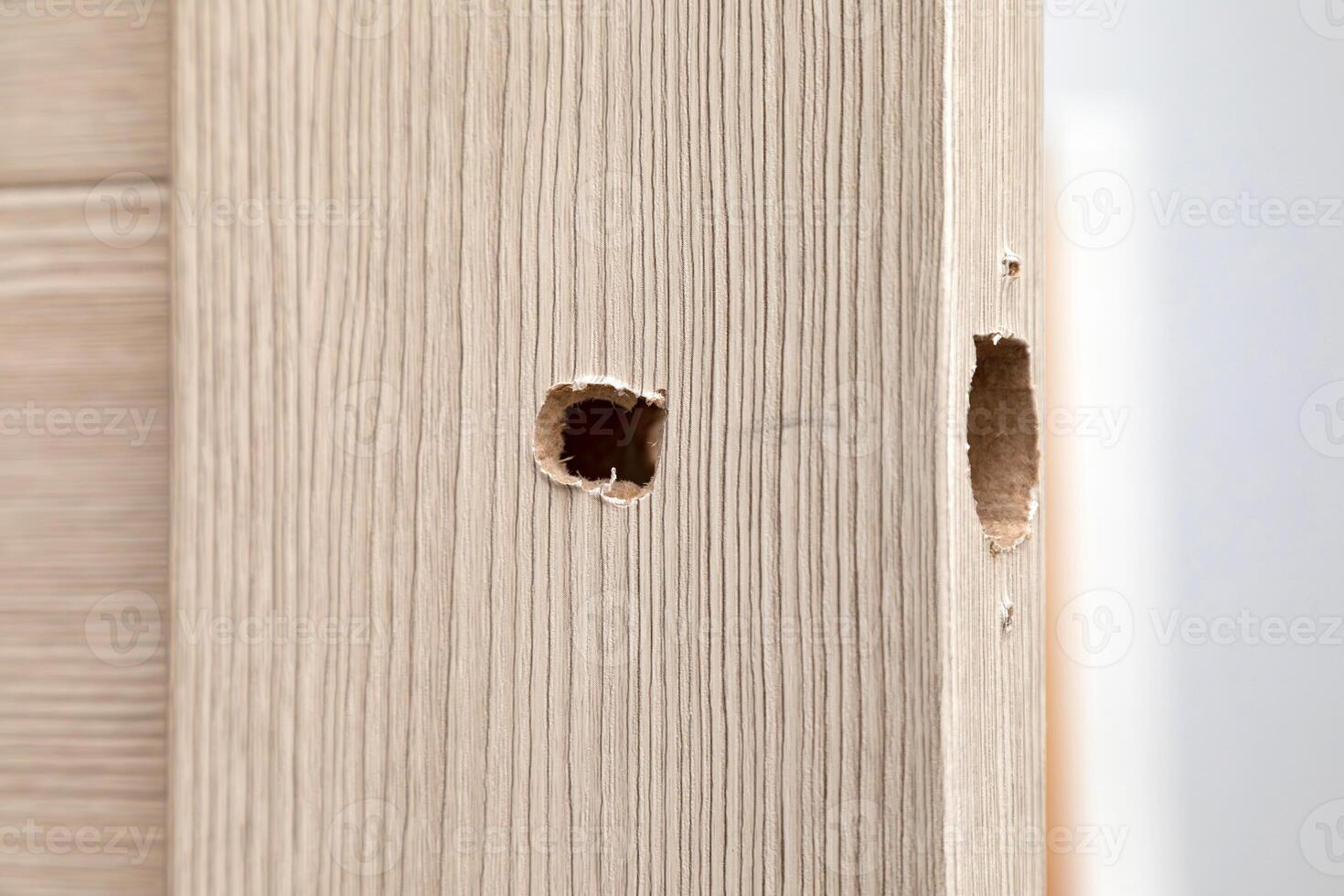 Installing a new door handle, closeup shot photo