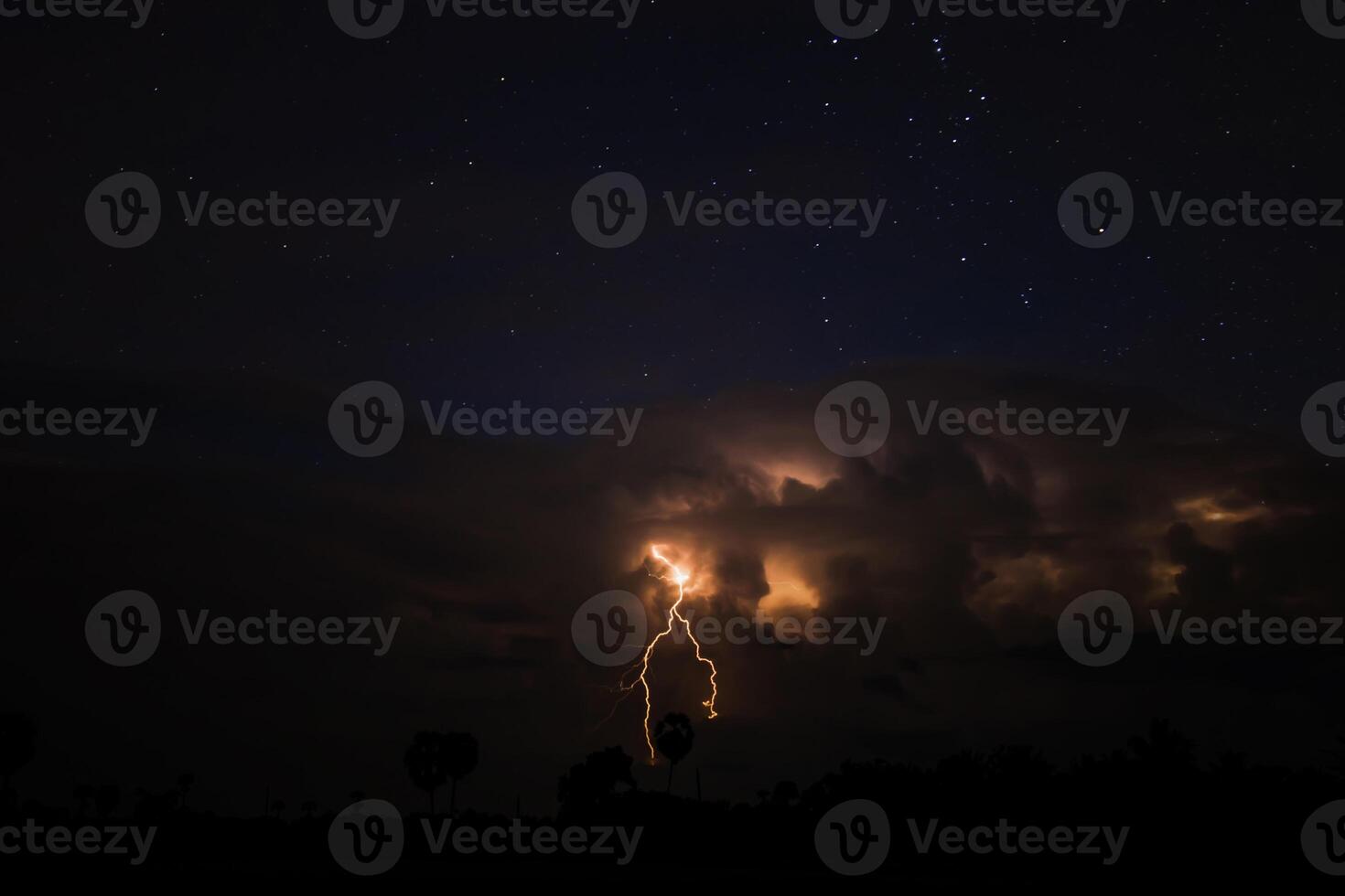 The sky is cloudy and lightning photo