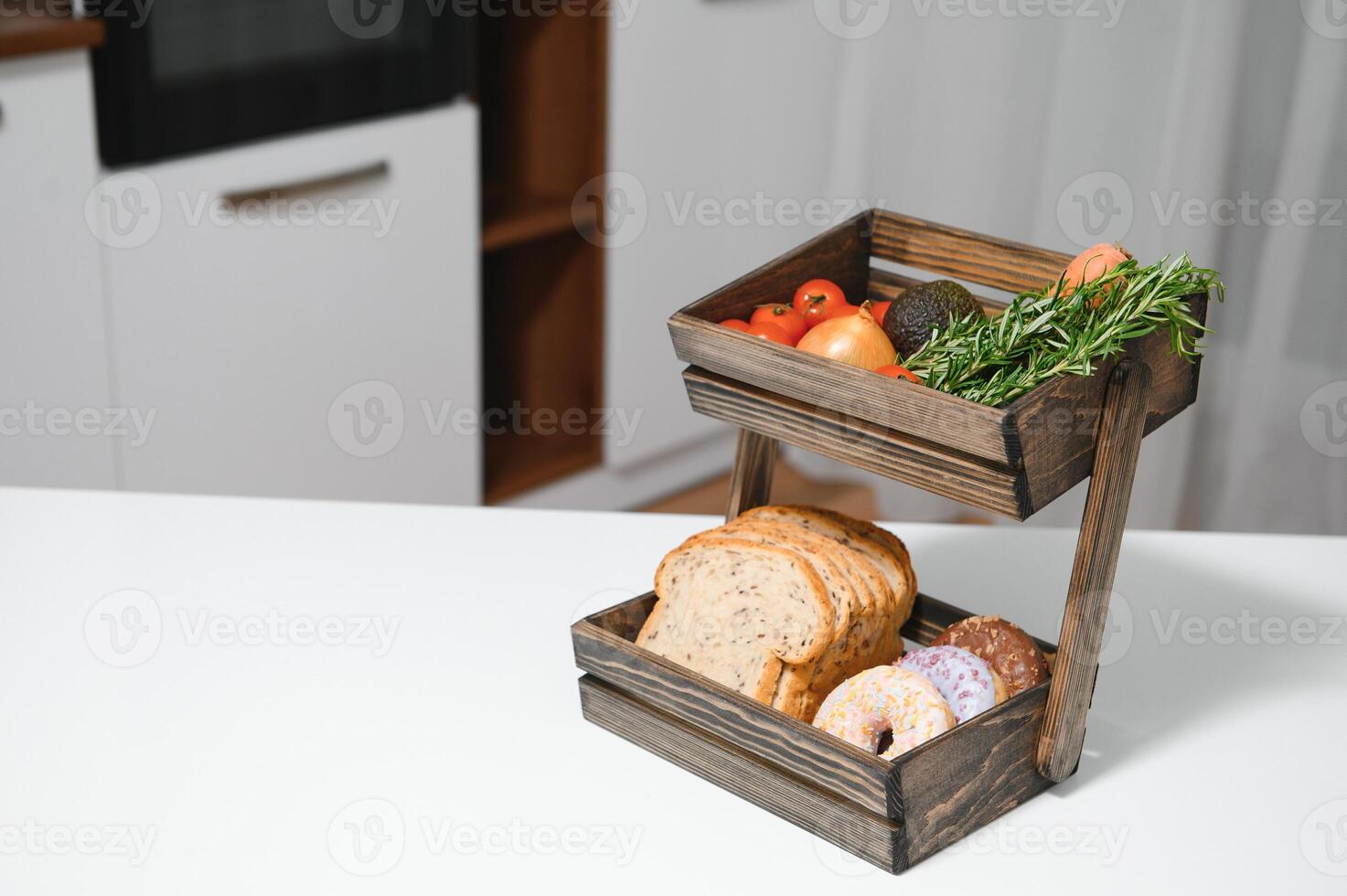 Craft wooden plate for storing bread or vegetables in the kitchen photo