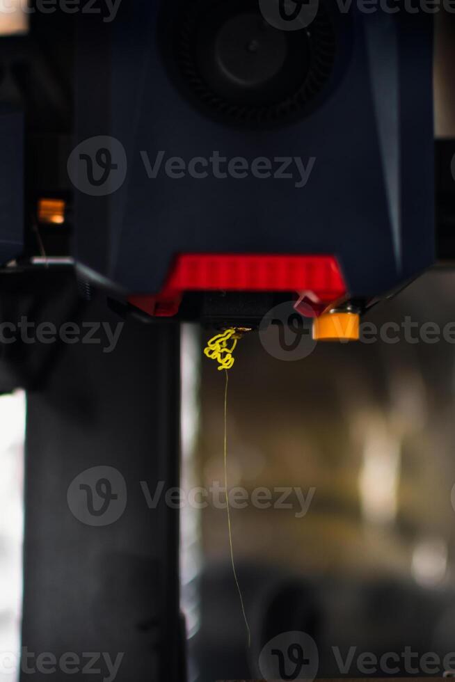 Extruder or 3d print head with pla filament, nozzle photo