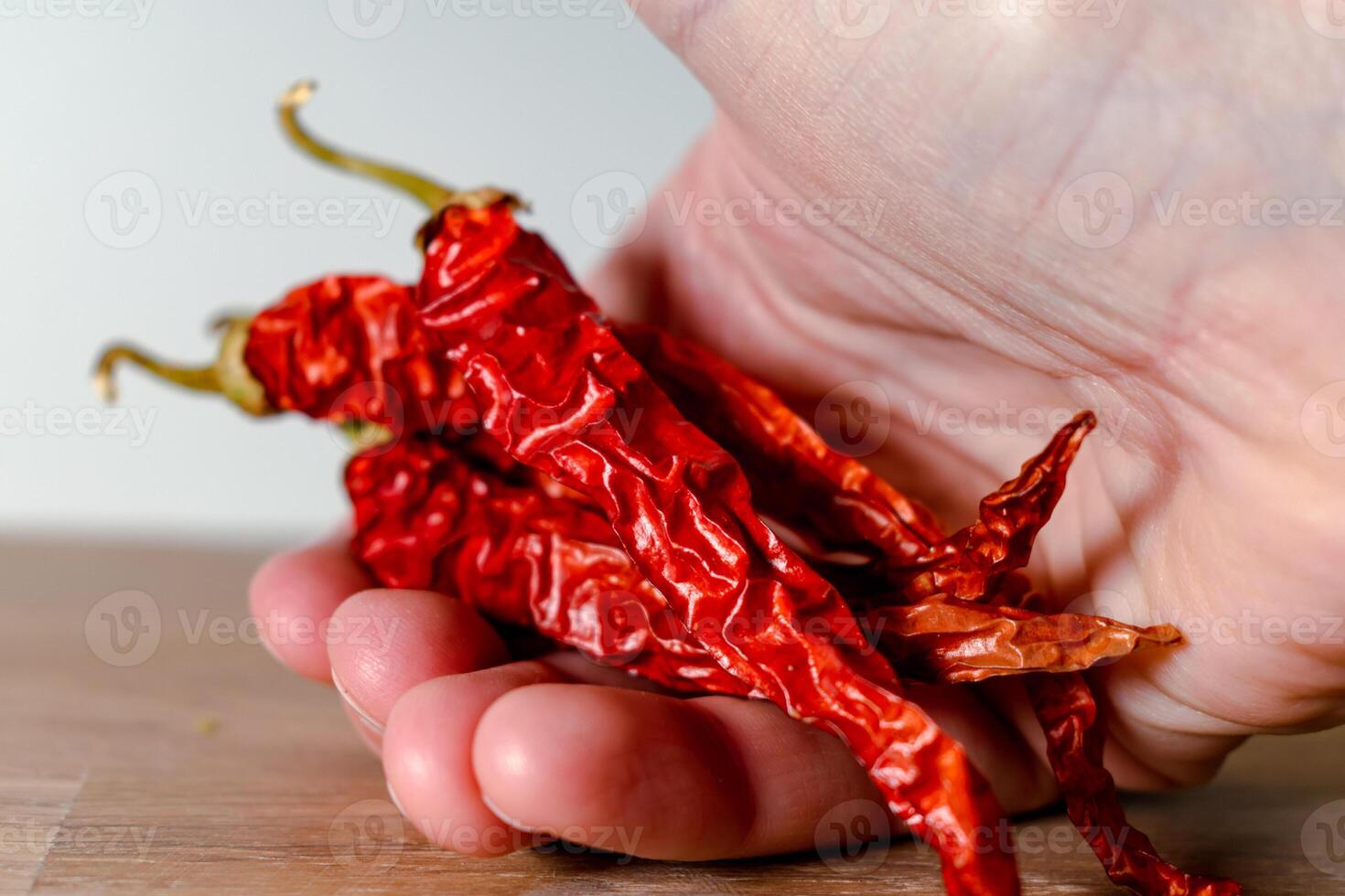 Dried red chili pepper, many benefits, stimulates the appetite and blood circulation, relieves muscle pain, antibacterial, capsicum annuum photo