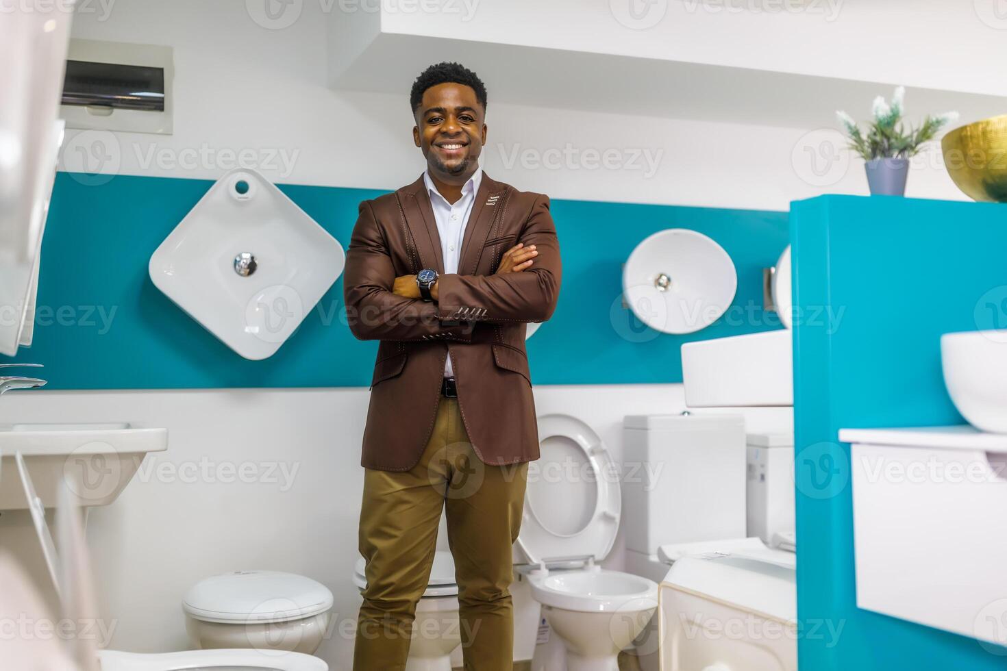 Portrait of salesperson in bathroom store. Happy man works in bath store. Sales occupation. photo
