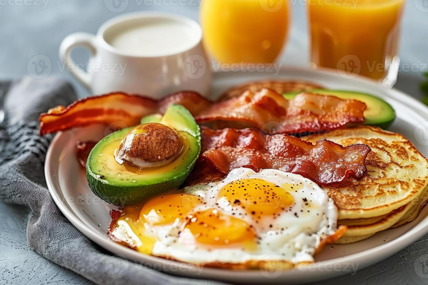 AI generated Breakfast set. Fried eggs, bacon, pancakes, avocado and orange juice. Generative AI photo