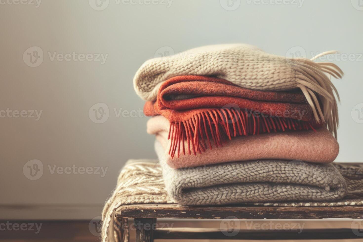AI generated Stack of wool or cashmere blankets. Autumn and winter concept. Generative AI photo