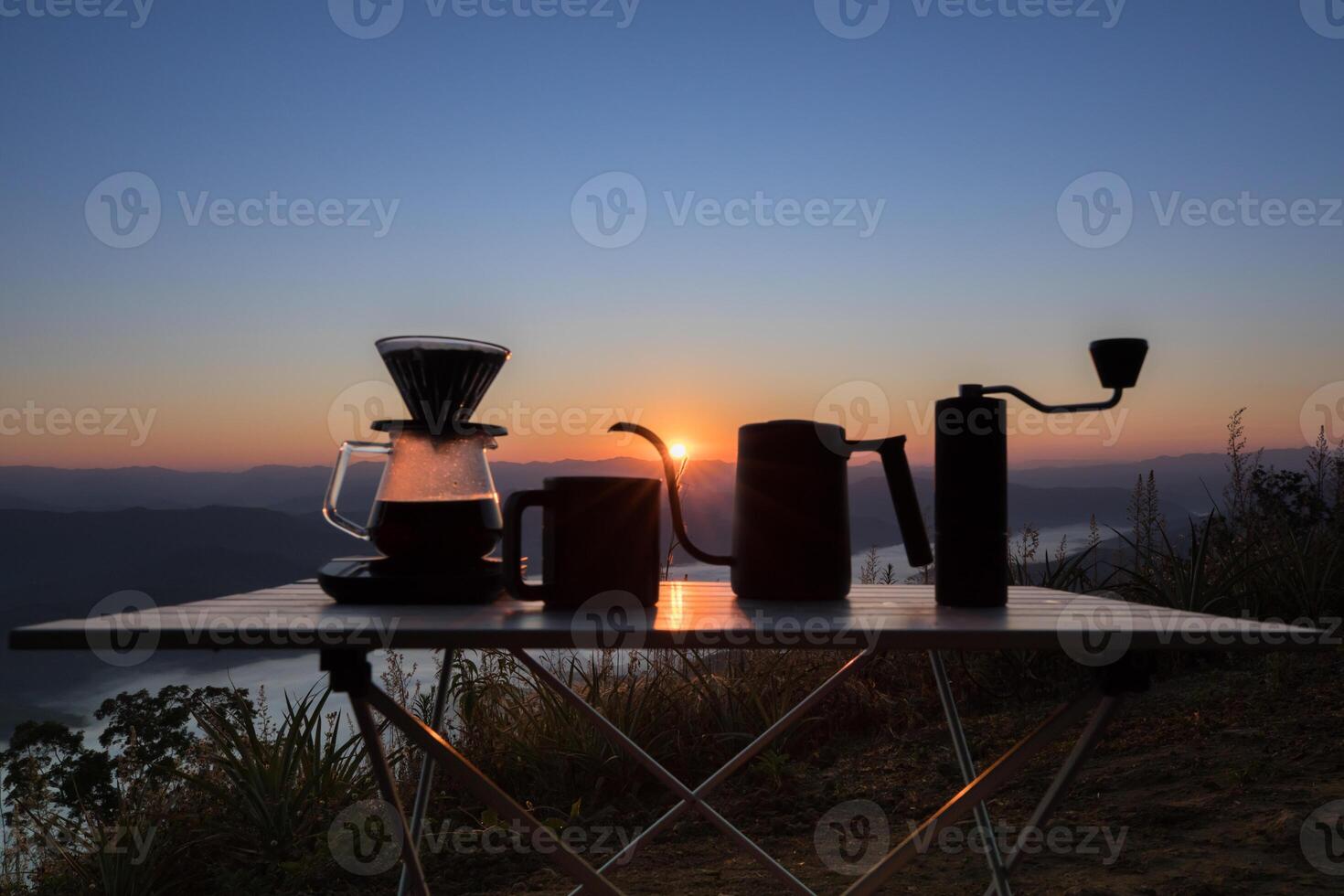 dipping coffee set on mountain background photo
