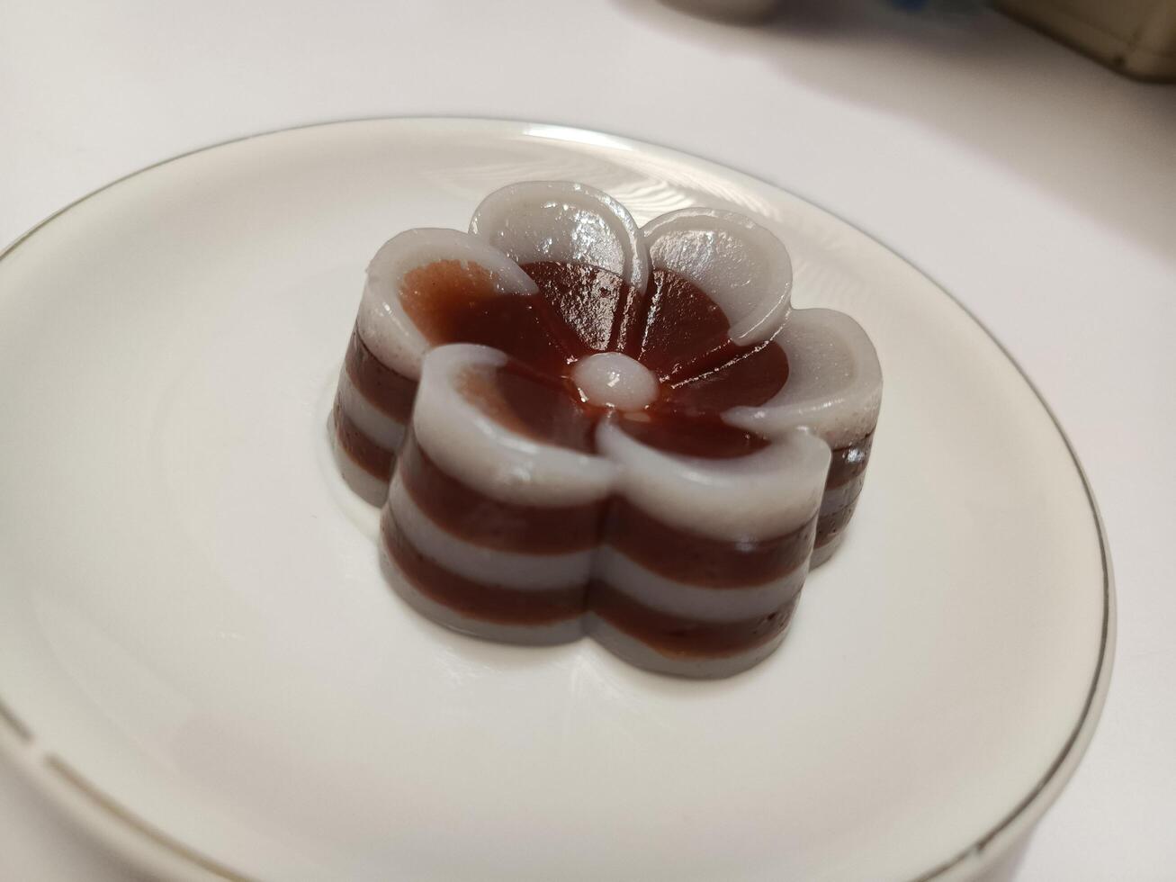 Photo of flower-shaped chocolate layer cake