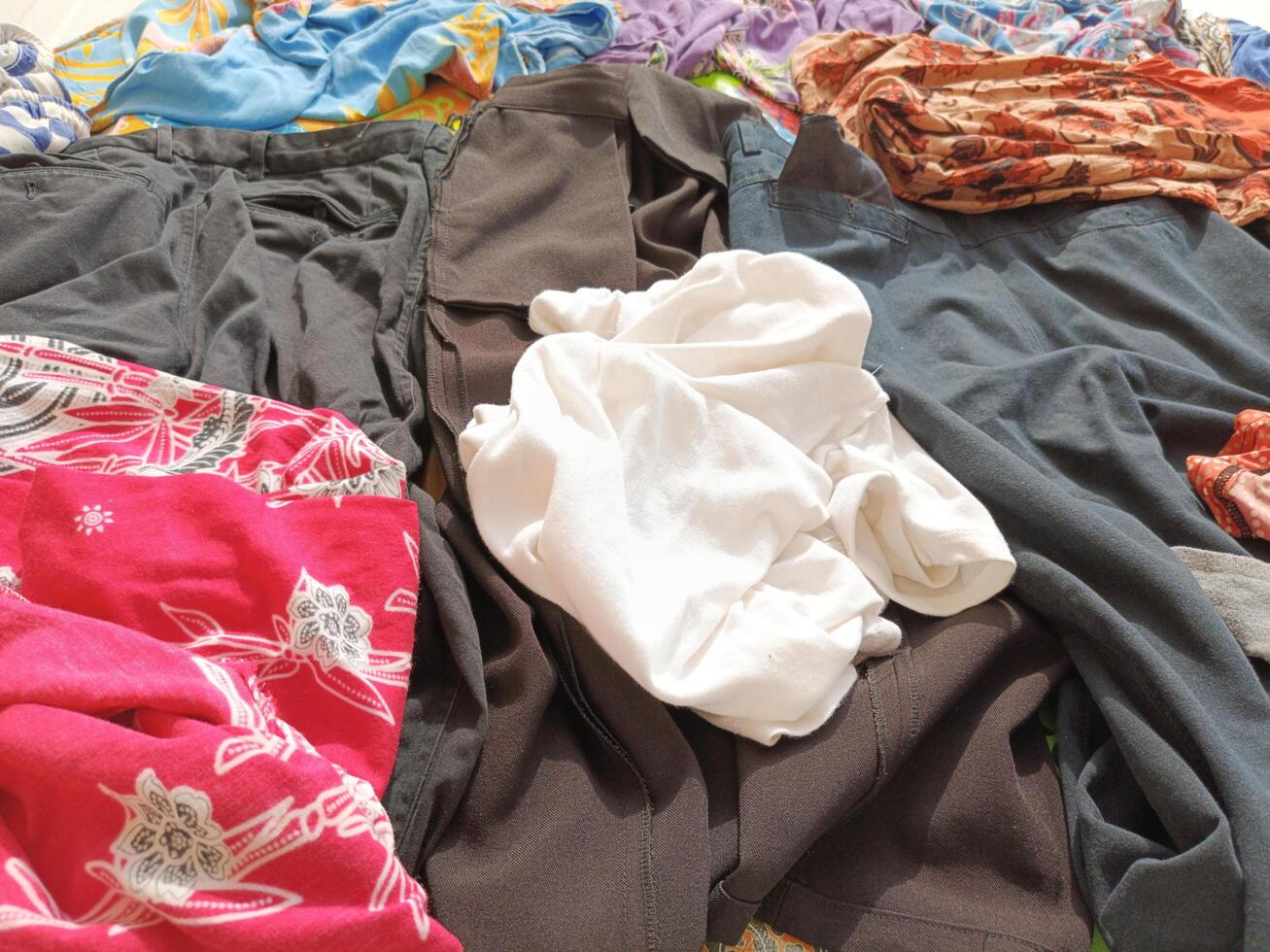 Photo of a collection of clothes spread out or stacked