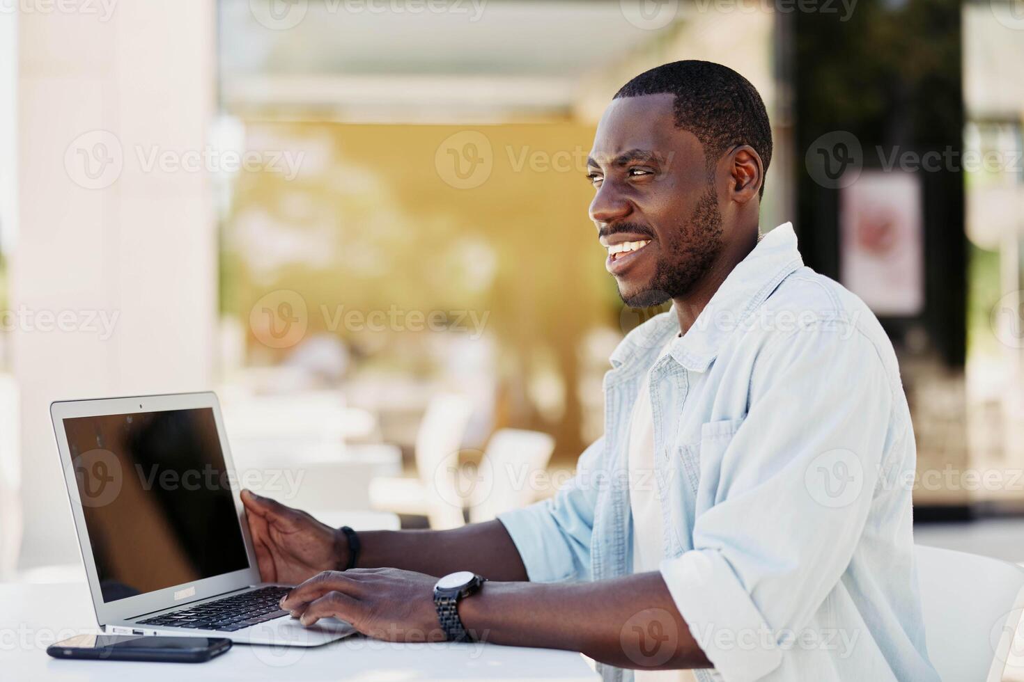 Handsome work sitting adult looking business professional young laptop technology male businessman photo