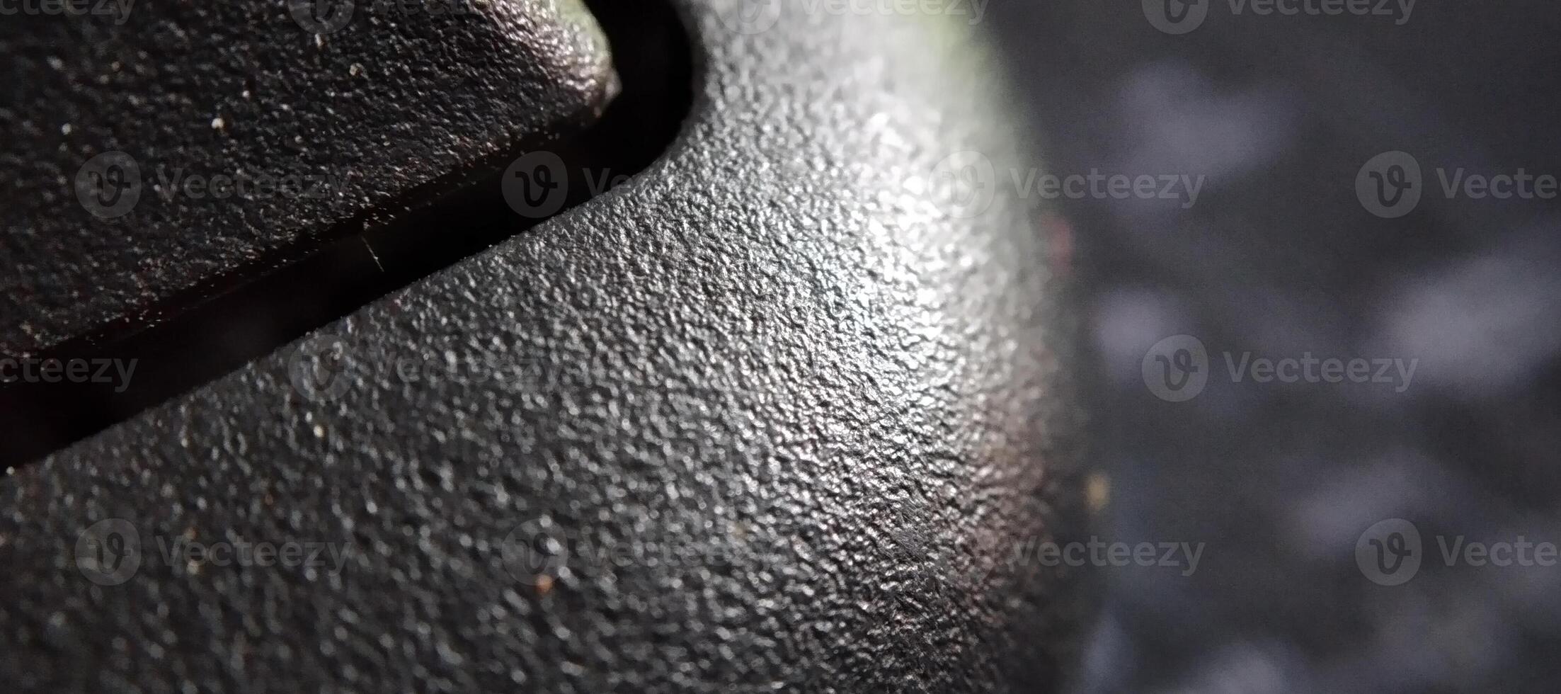 Macro shot of a black computer mouse, shallow depth of field photo