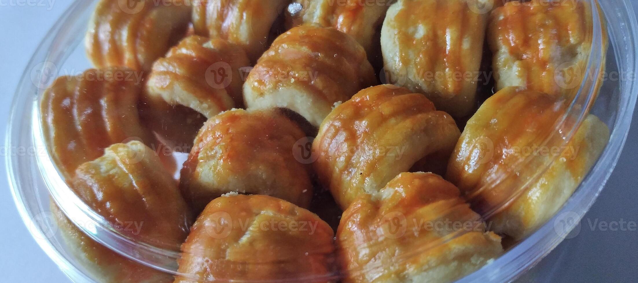 Baked croissants in a glass bowl. Homemade pastry. photo