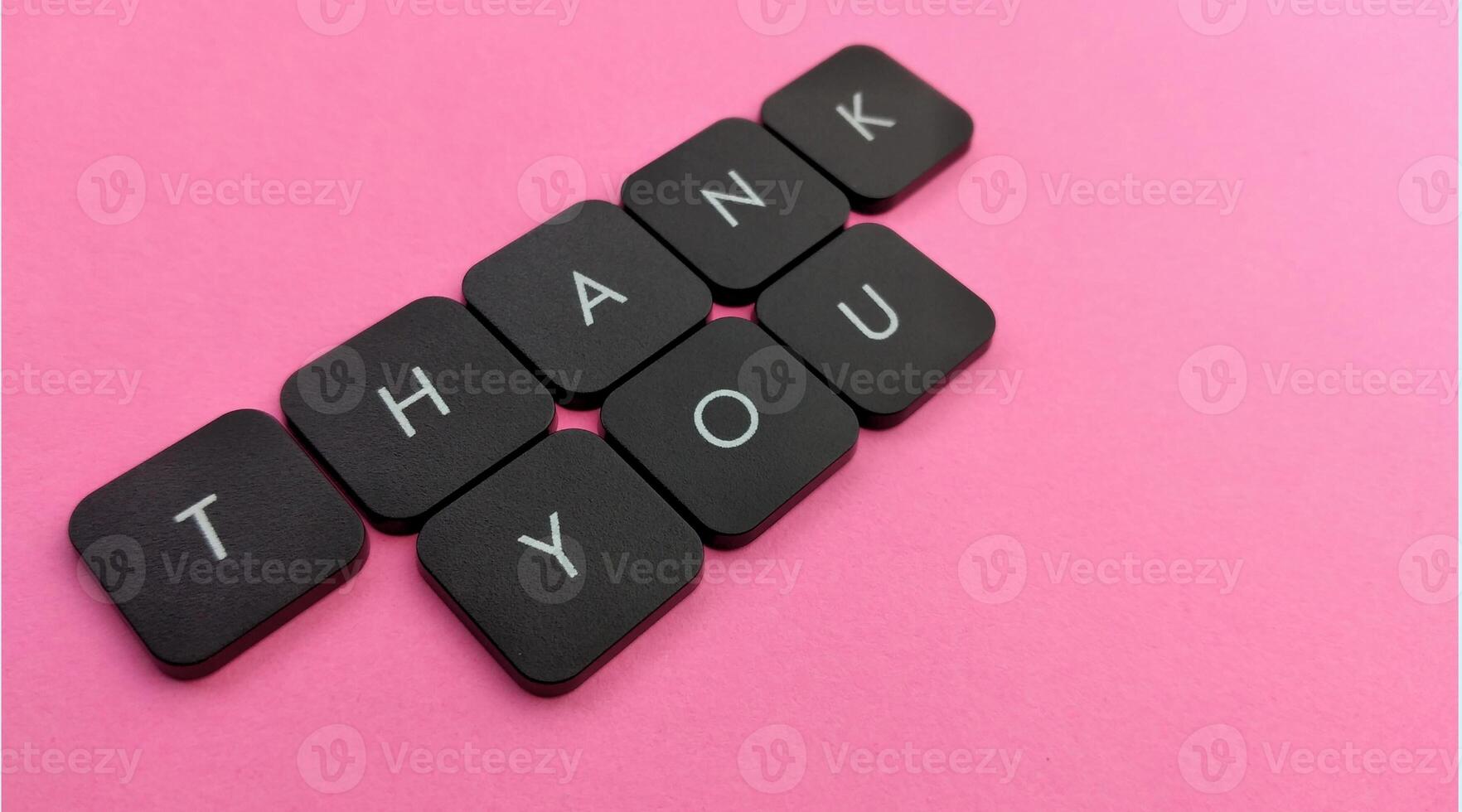 thank you typography made with laptop keyboard pieces photo