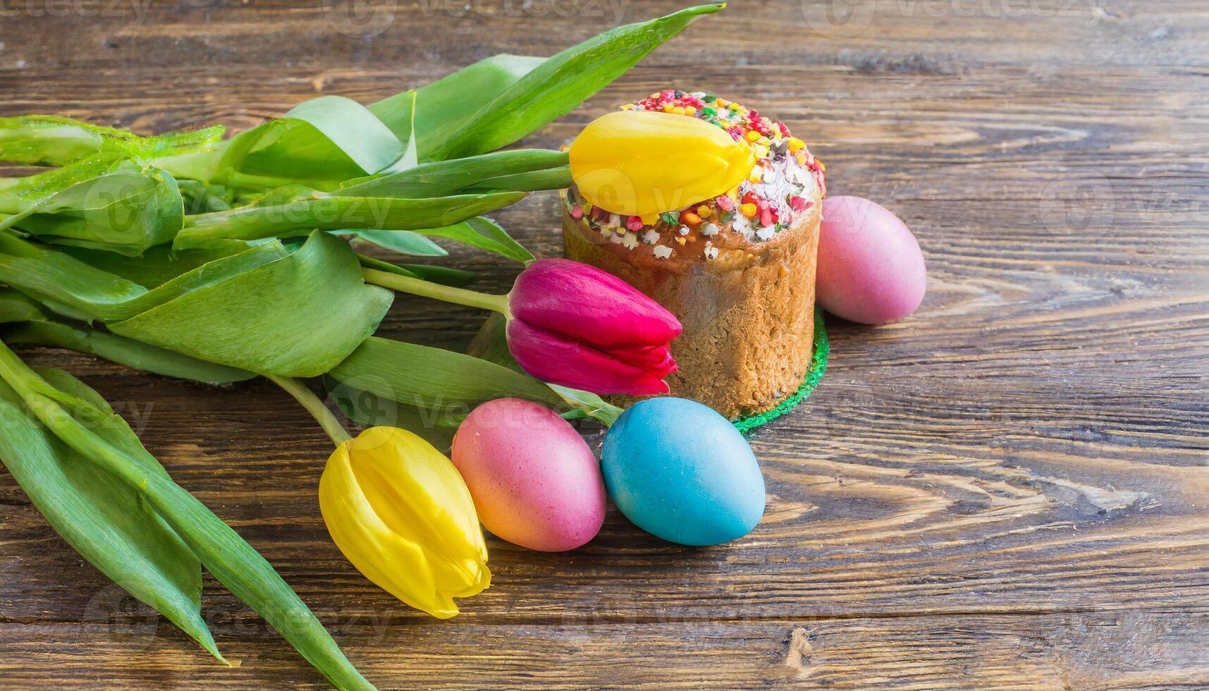 Easter egg panettone bread cake background Happy easter spring holiday tulip photo