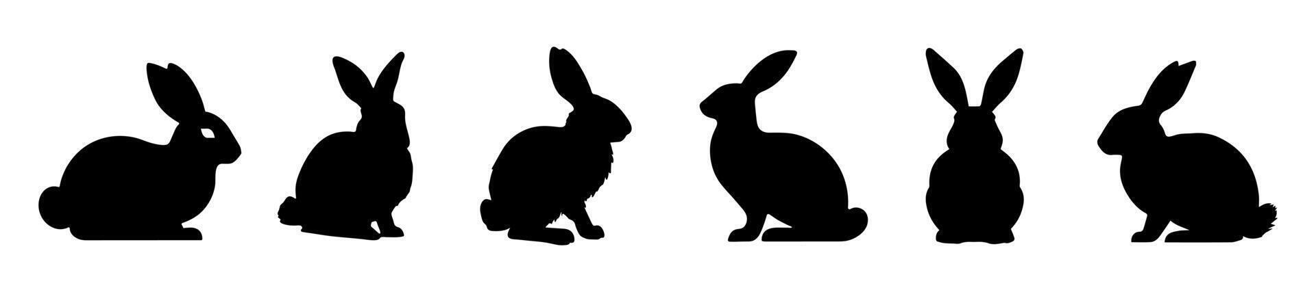 Set of Rabbit silhouettes. Easter bunnies. Isolated on white backdrop. A simple black icons of hares. Cute animals. Ideal for logo, emblem, pictogram, print, design element for greeting card. vector