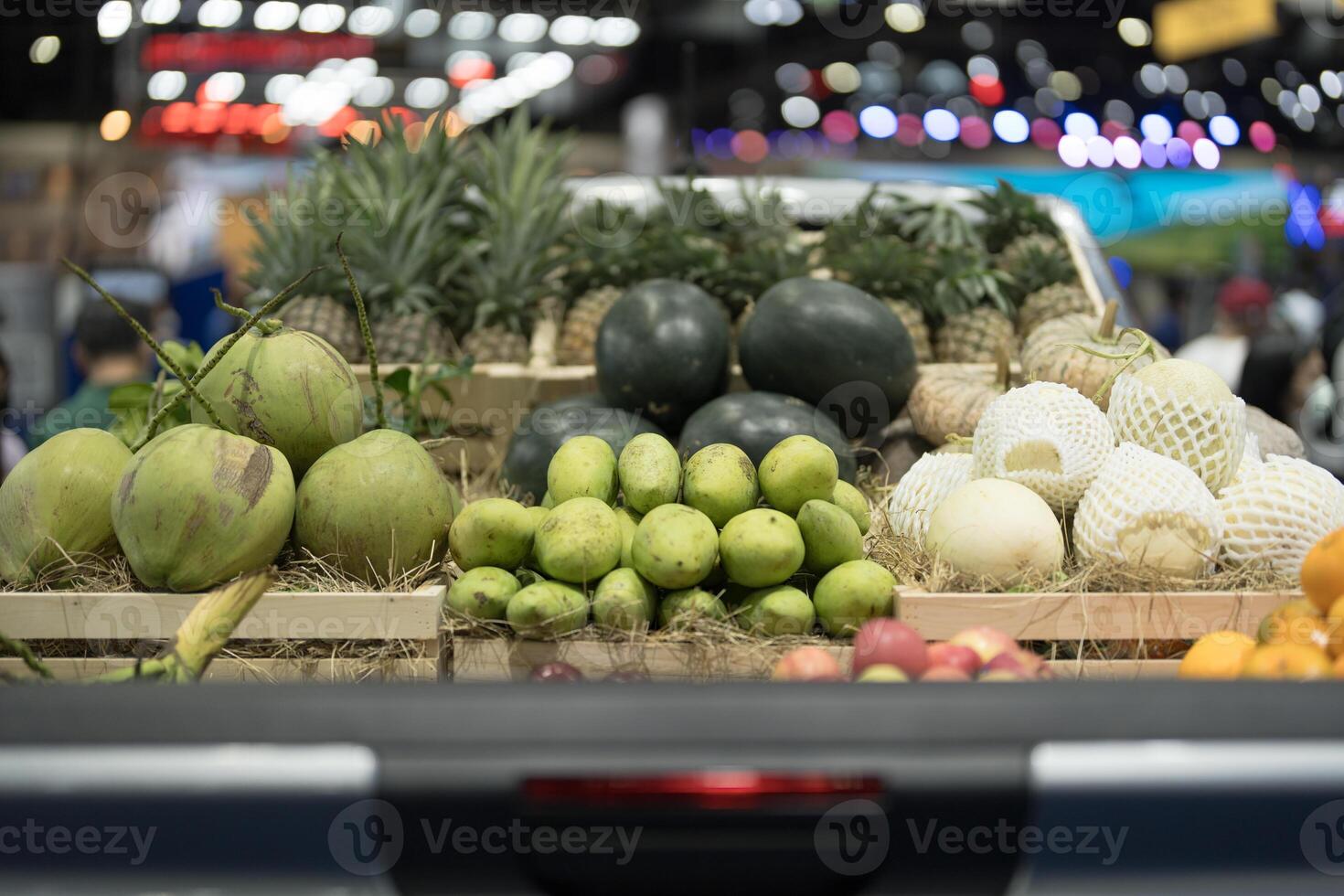 Fresh produce on display at market stall photo