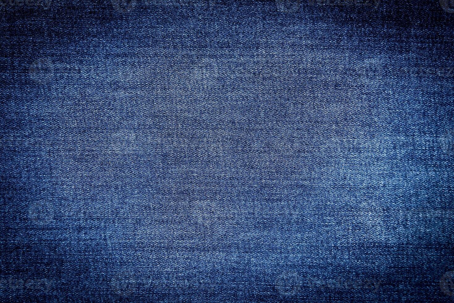 Jeans texture. Denim jeans background. Copy space. Selective focus. photo