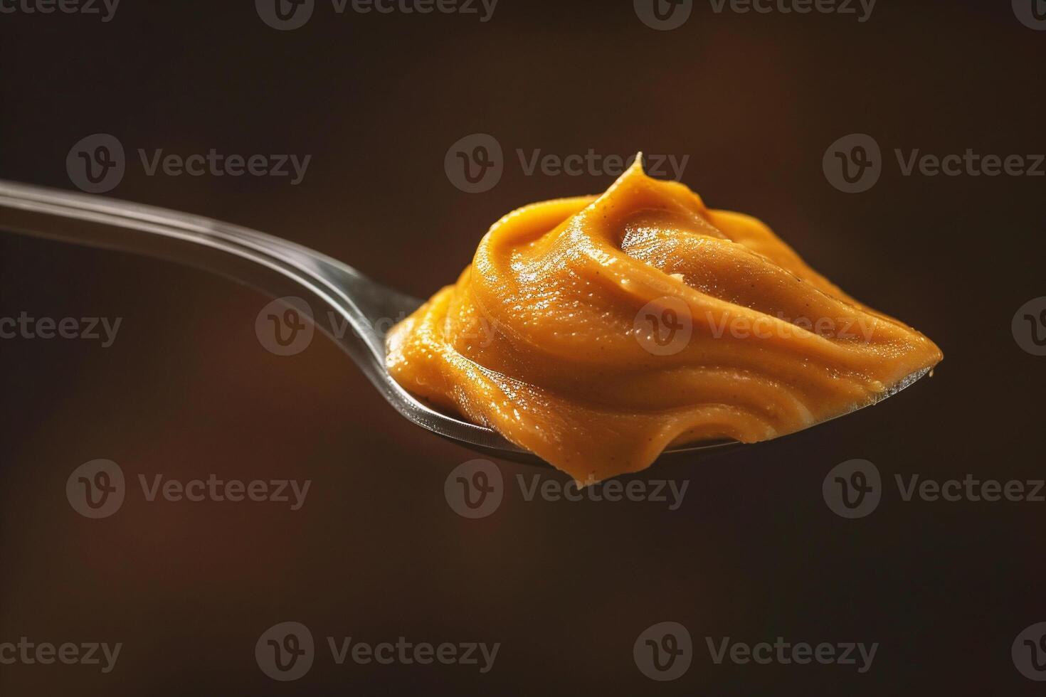 AI generated Creamy peanut butter on a spoon, close-up. photo