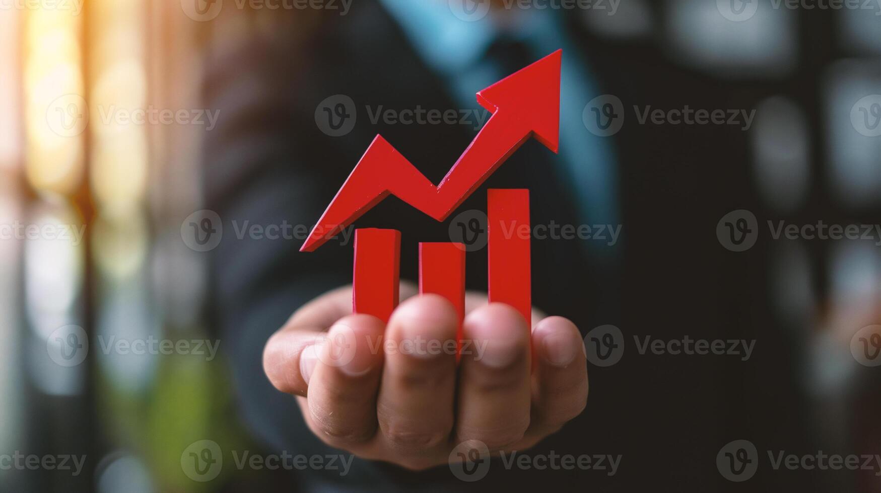 AI generated Businessman holding a red arrow graph. Success and growth concept. photo
