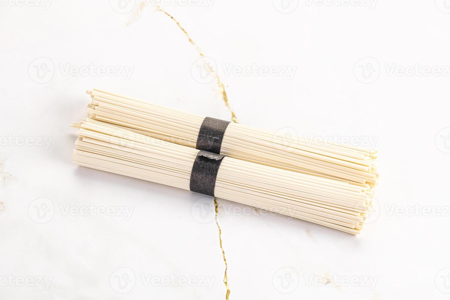 Raw asian udon noodle for cooking photo