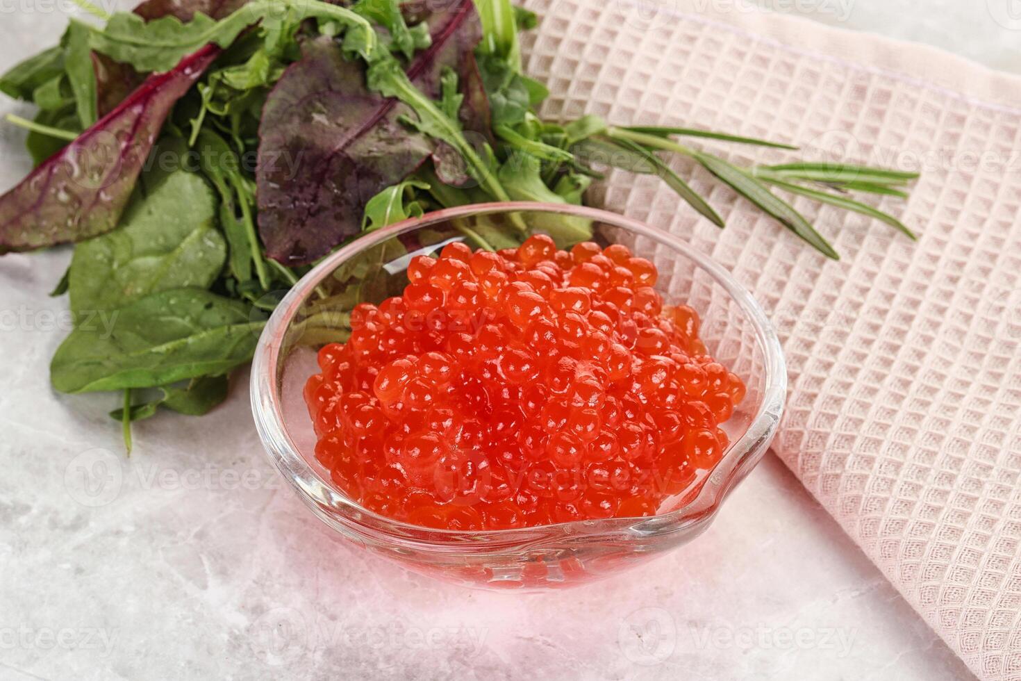 Red caviar in the bowl photo