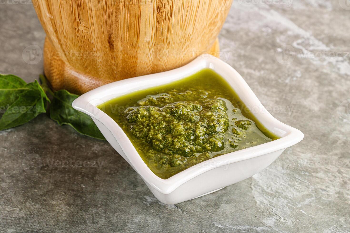 Homemade vegetarian basil pesto sauce photo