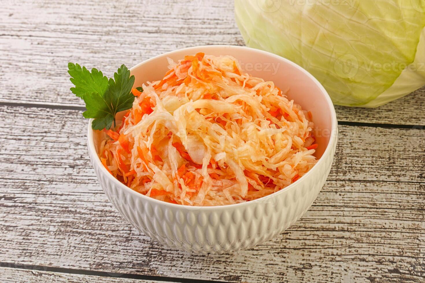 Sauerkraut - pickled cabbage in the bowl photo