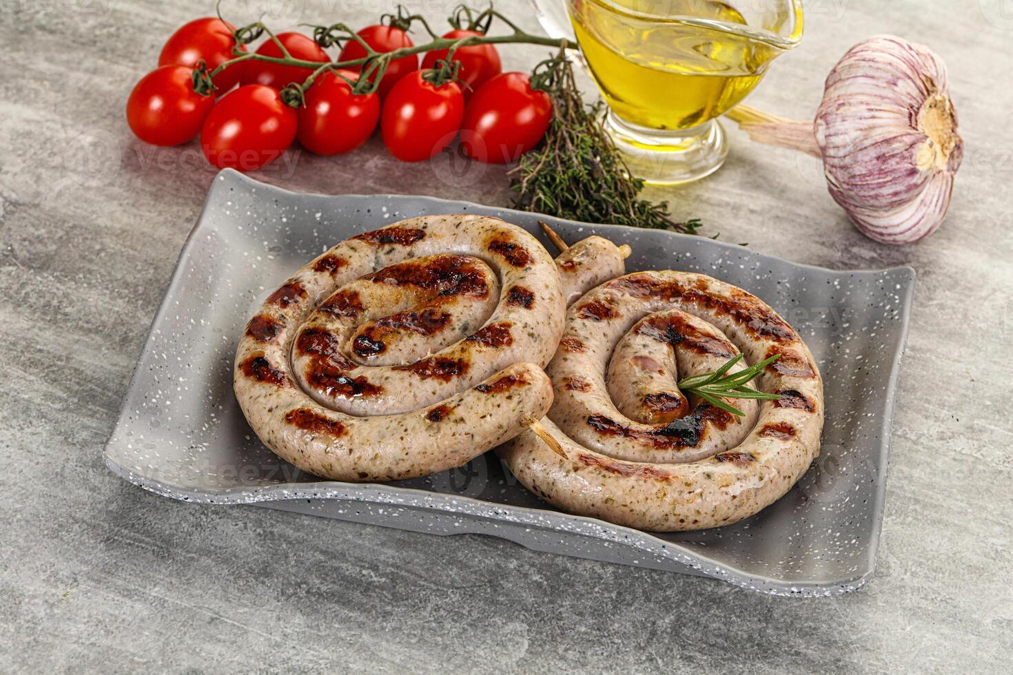 Grilled natural spiral meat sausage photo