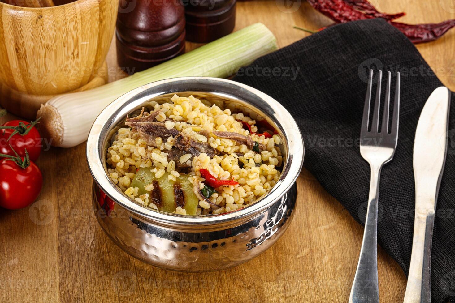 Bulgur with lamb and vegetables photo
